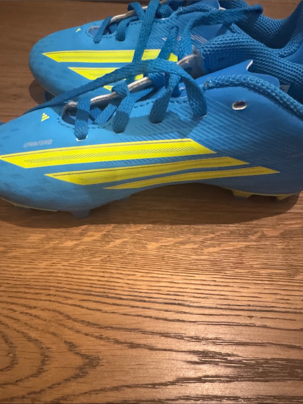 adidas F50 Blue Youth Soccer Cleats with Yellow Stripes